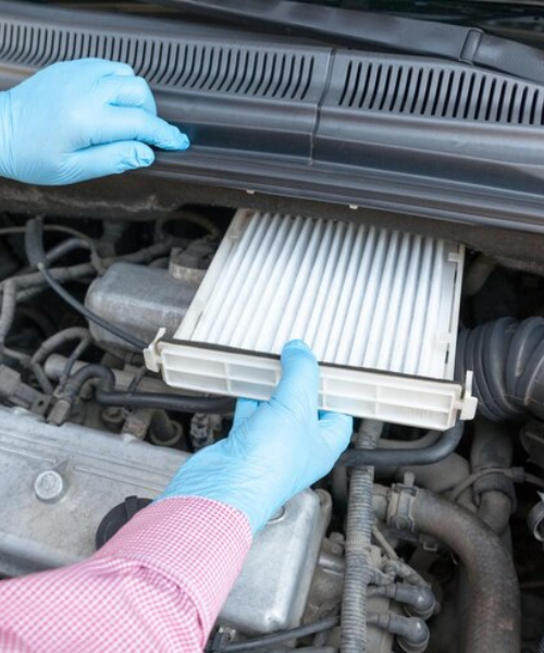 Mechanic Cleaning a DPF